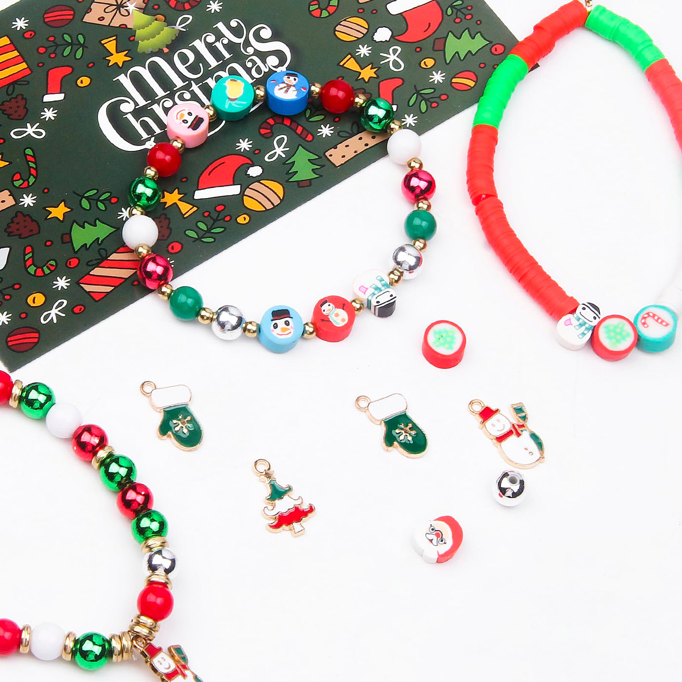 Make your own set of beads for stringing with Christmas tree pendants and clay beads