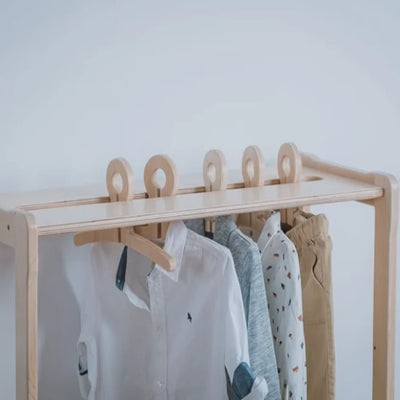 Montessori nursery furniture. Coat hanger for children with shelf